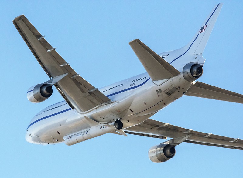 In this Oct. 1, 2019, photo made available by NASA, a Northrop Grumman L-1011 Stargazer aircraft takes off from Vandenberg Air Force Base in Calif. The company's Pegasus XL rocket, containing NASA's Ionospheric Connection Explorer (ICON), is attached beneath the aircraft. The explorer is targeted to launch on Oct. 9, 2019, from Cape Canaveral Air Force Station in Florida. ICON will study the frontier of space - the dynamic zone high in Earth's atmosphere where terrestrial weather from below meets space weather above. (Randy Beaudoin/NASA via AP)