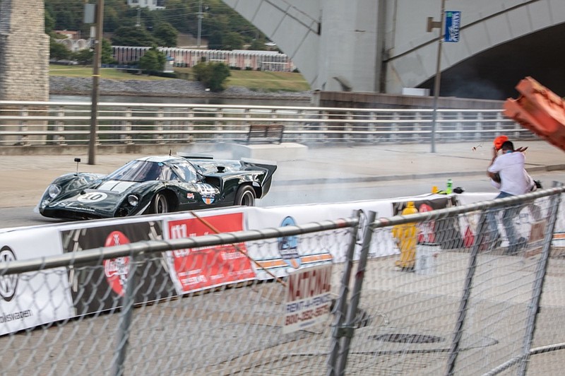 This photo taken at around 9:15 a.m. near the grass field behind the Tennessee Aquarium shows around the time a Lola T-17 experienced a mechanical failure and hit a barrier, injuring two course workers during the Chattanooga MotorCar Festival on Friday, Oct. 11, 2019. / Photo by Steven Llorca