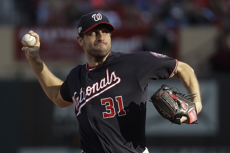 AP photo by Mark Humphrey / Washington Nationals starter Max Scherzer pitches during the fourth inning of Game 2 of the NLCS against the host St. Louis Cardinals on Saturday.