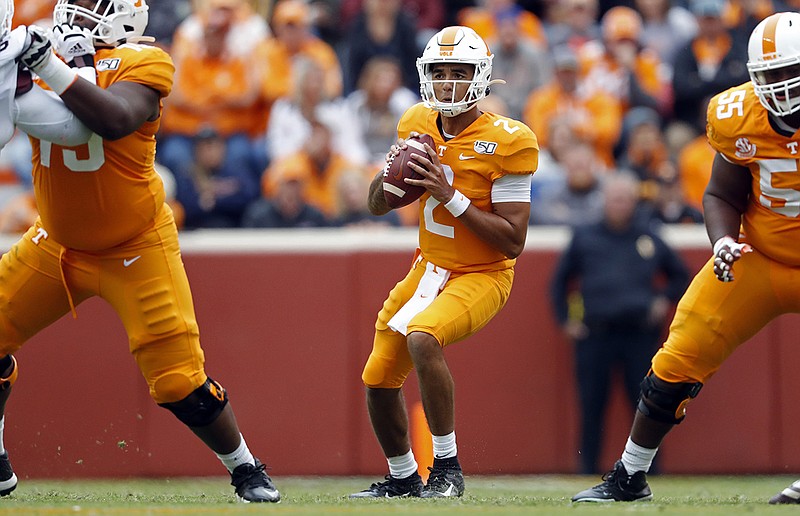 AP photo by Wade Payne / Tennessee quarterback Jarrett Guarantano looks for a receiver during Saturday's game against Mississippi State.