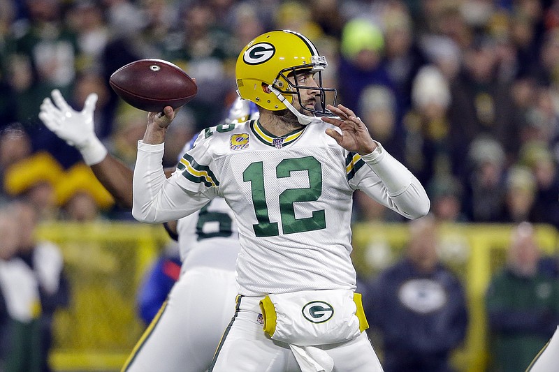 Green Bay Packers quarterback Aaron Rodgers drops back to pass during the first half of an NFL football game against the Detroit Lions, Monday, Oct. 14, 2019, in Green Bay, Wis. (AP Photo/Jeffrey Phelps)