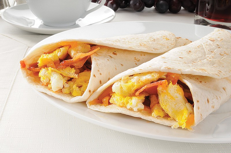 A scrambled egg and bacon burrito. / Getty Images/iStockphoto