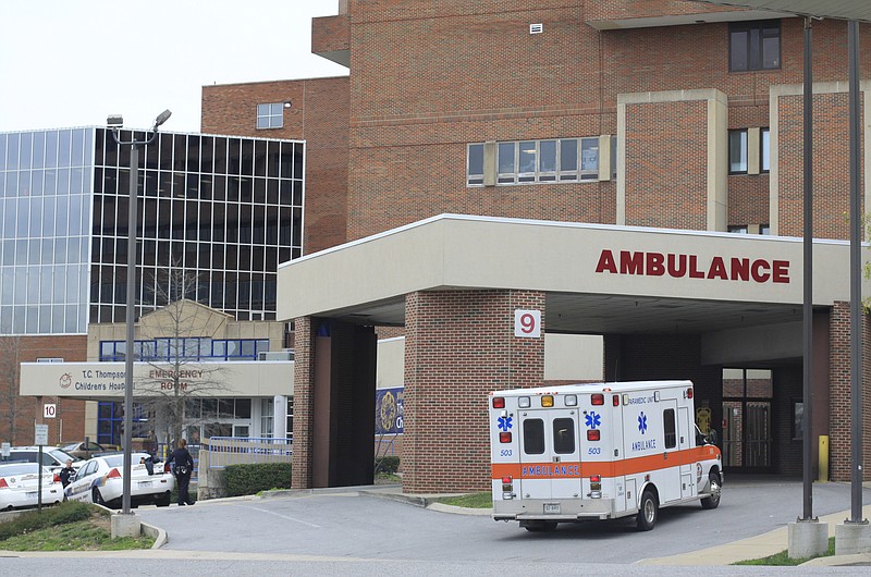 Staff file photo — An ambulance pulls into Erlanger's emergency room entrance in this file photo.
