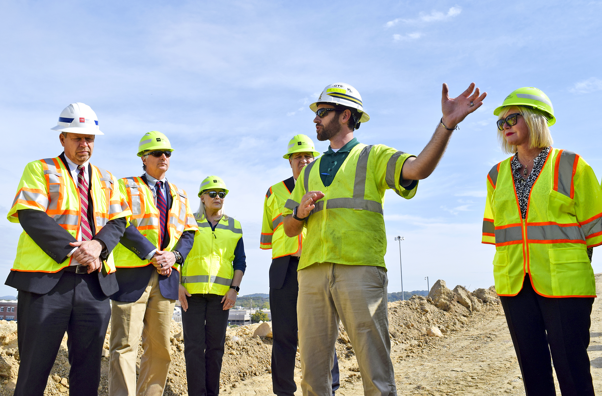 Staff Photo by Robin Rudd/ Mike Nadolski, project manager for C.W. Matthews Contracting Company, Inc., second from right, explains the progress of the modification. Listening from left are, Joe Deering TDOT Region 2 Director/Assistant Chief Engineer, Clay Bright TDOT Commissioner, Jennifer Flynn Region 2 Community Relations Officer, Paul Degges TDOT Deputy Commissioner/Chief Engineer and Tennessee State Representative Esther Helton. Tennessee Department of Transportation Commissioner Clay Bright, along with state and local elected officials, visited the I-75/I-24 interchange modification project in Chattanooga, Hamilton County on Tuesday, October 15, 2019.