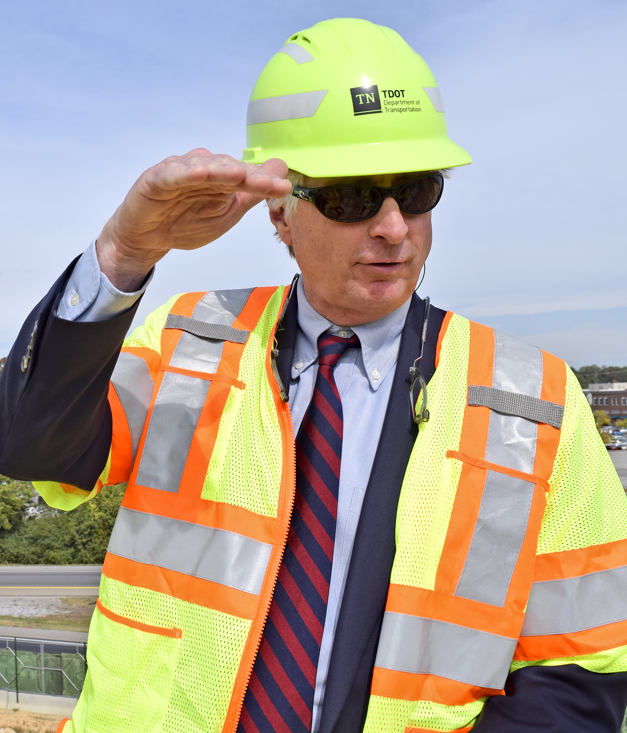 Staff Photo by Robin Rudd/ TDOT Commissioner Clay Bright discusses the layout of the bridges in the project. Tennessee Department of Transportation Commissioner Clay Bright, along with state and local elected officials, visited the I-75/I-24 interchange modification project in Chattanooga, Hamilton County on Tuesday, October 15, 2019.