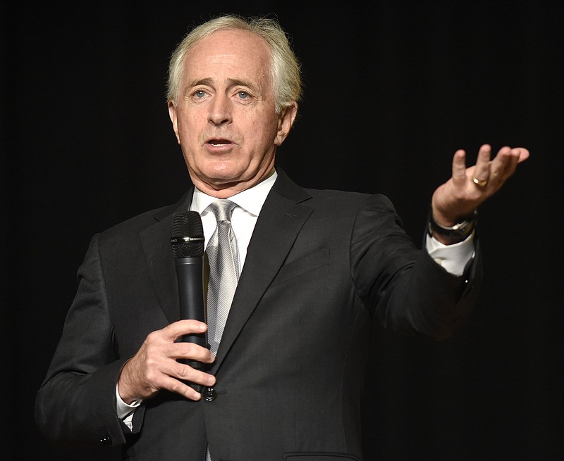 Staff File Photo by Robin Rudd / Sen. Bob Corker answers a question from McCallie senior Ryan Huynh. Sen. Corker visited the McCallie School on Nov. 30, 2018.