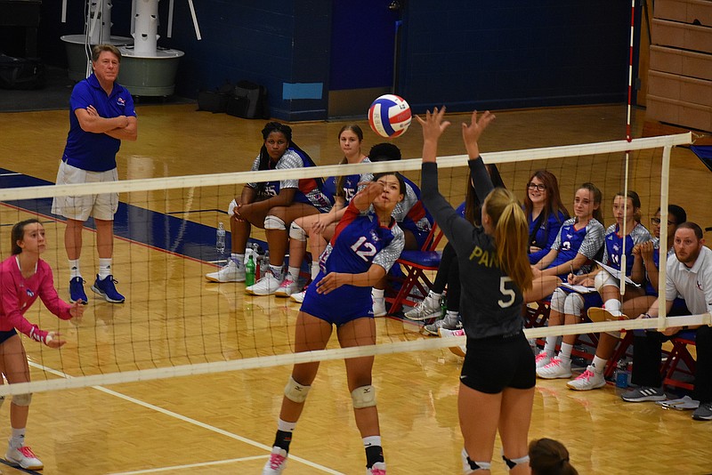 Staff photo by Patrick MacCoon / Red Bank outside hitter Shante Smith follows through on a big swing during Tuesday's Region 4-AA semifinal home match against Stone Memorial.