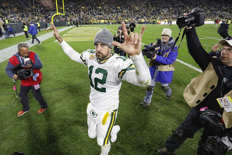 Green Bay Packers quarterback Aaron Rodgers celebrates as he walks off the field following an NFL football game against the Detroit Lions, Monday, Oct. 14, 2019, in Green Bay, Wis. Green Bay won 23-22. (AP Photo/Mike Roemer)


