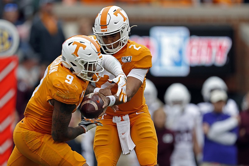 AP photo by Wade Payne / Tennessee running back Tim Jordan takes a handoff from Jarrett Guarantano during last Saturday's game against Mississippi State. Jordan had his first touchdown of the season as the Vols won 20-10.