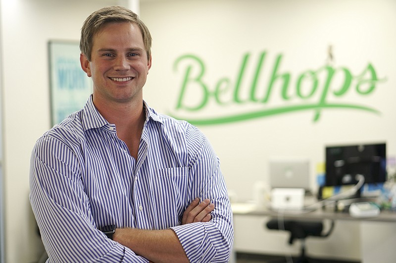 Staff Photo by Dan Henry / The Chattanooga Times Free Press- 9/9/16. Cameron "Cam" Doody, Cofounder and president of Bellhops, stands outside of his company's office in Warehouse Row on Friday, September 9, 2016. 