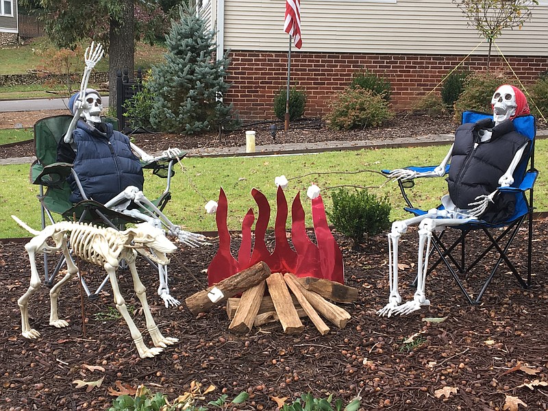 Photo from Bev Fulbright / A campfire night finds Mr. and Mrs. Bones dressed for cool weather. Even Ribs, the dog, gets in on the marshmallow roasting action.
