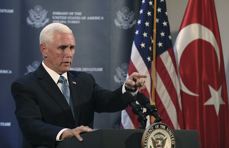 U.S. Vice President Mike Pence speaks at the U.S. ambassador's residence during a news conference in Ankara, Turkey, Thursday, Oct. 17, 2019. Pence announced that the U.S. and Turkey had agreed to a five-day cease-fire in northern Syria to allow for a Kurdish withdrawal from a security zone roughly 20 miles south of the Turkish border, in what appeared to be a significant embrace of Turkey's position in the week-long conflict. (AP Photo/Burhan Ozbilici)