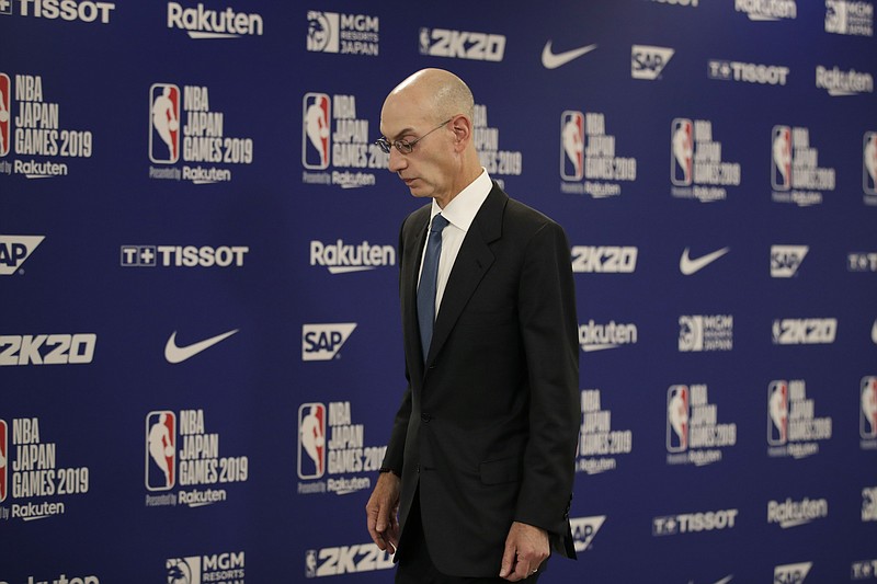 NBA Commissioner Adam Silver walks away from the podium after speaking at a news conference before an NBA preseason basketball game between the Houston Rockets and the Toronto Raptors Tuesday, Oct. 8, 2019, in Saitama, near Tokyo. (AP Photo/Jae C. Hong)