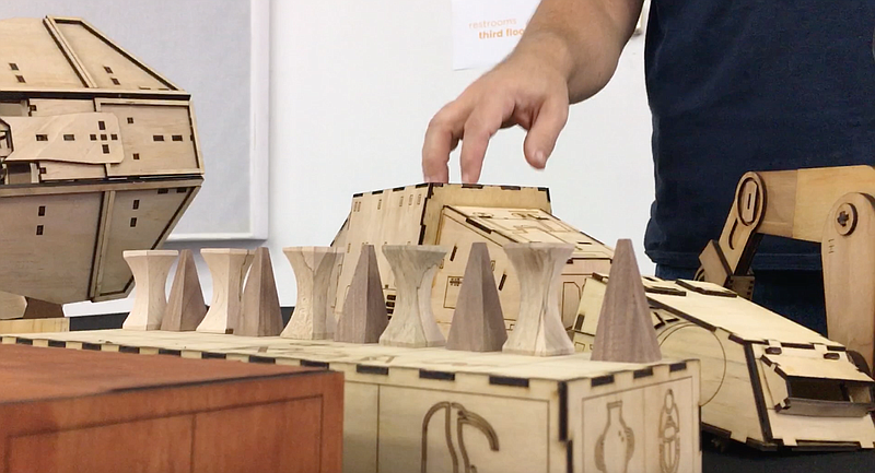 President Jeff Johnson shows off some projects created by Chatt Lab members during Chattanooga Maker Day on Saturday, Oct. 19, 2019. / Staff photo from video by Kim Sebring