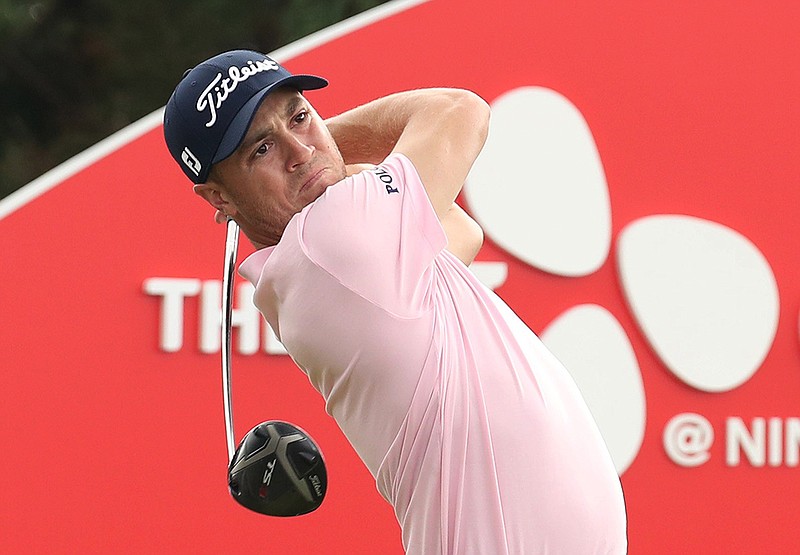 AP photo via Yonhap by Park Ji-ho / Justin Thomas tracks his shot on the 18th hole during the final round of the CJ Cup at Nine Bridges on Sunday on Jeju Island, South Korea.