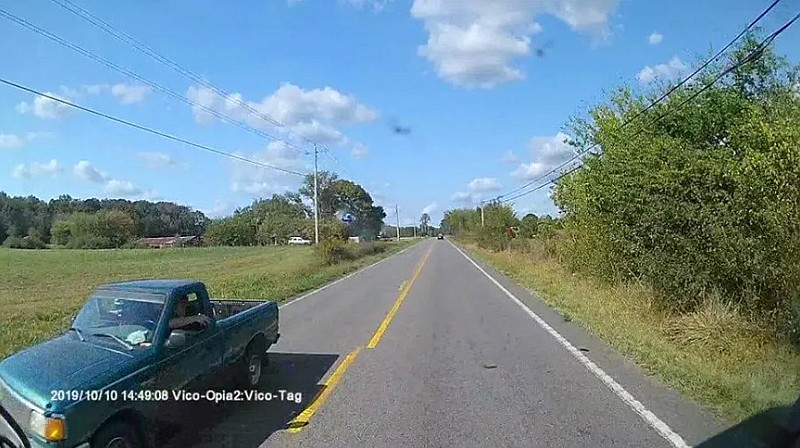 Two Polk County youths have been charged after authorities say they threw an object onto the windshield of a moving charter bus.