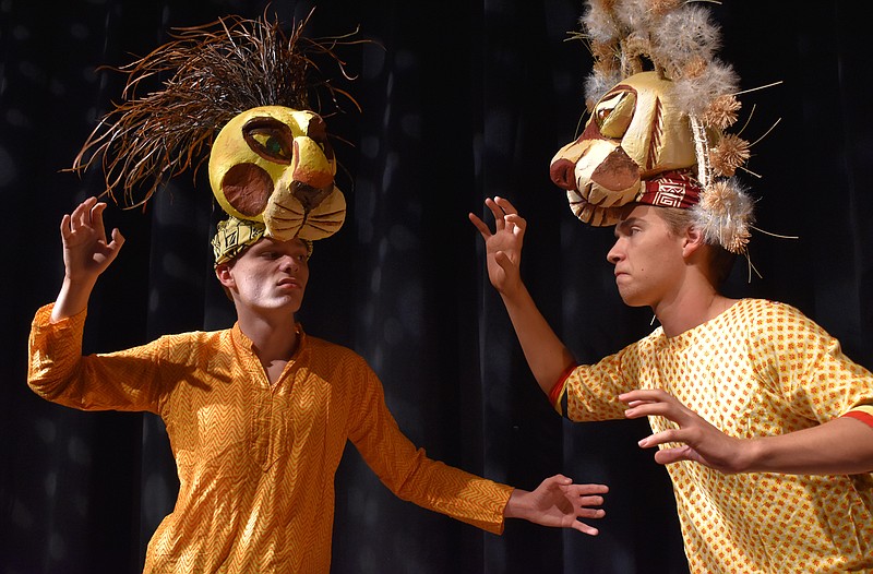 Photo by Julie Van Valkenburg / Drew Champion, at right, plays the noble Mufasa, who combats his evil brother Scar, played by Noah Hawkins.