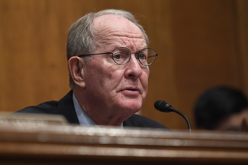 In this Sept. 24, 2019, file photo, Sen. Lamar Alexander, R-Tenn., speaks on Capitol Hill in Washington. Alexander says in a written statement that impeaching Trump would be a "mistake." He says next year's election is "the right way to decide who should be president." He says it was "inappropriate" for Trump to push another country to investigate a political opponent. (AP Photo/Susan Walsh, File)