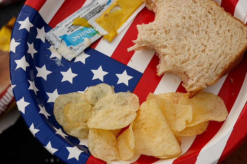 Staff file photo / A sandwich is served on an American flag plate on July 3, 2019.
