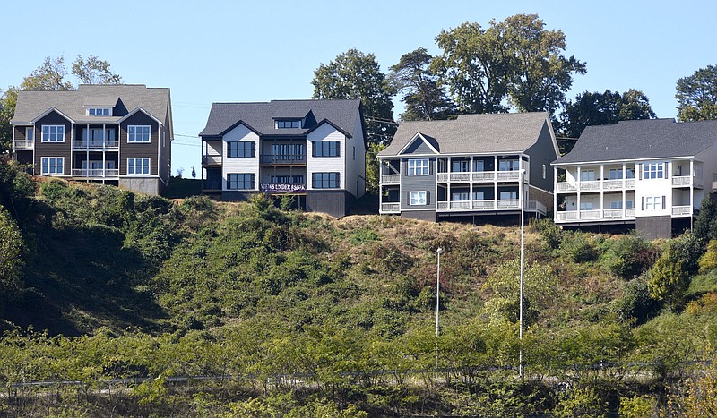 Staff Photo by Robin Rudd/  These homes, on Whithall Road, are built on a slope over U.S. Highway 27.  Chattanooga planners are proposing an array of new regulations to limit land erosion and property damage amid growing development. But, the chief homebuilders association in the city says many of its members view the proposals as an overreach and “the most damaging regulatory changes to the building and construction industry in decades.”  The home were photographed on October 23, 2019.  