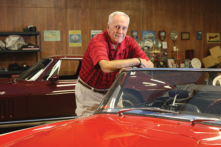 Staff photo by Erin O. Smith / Gary Higbee, 74, poses for a photo in his shop in Rossville, Georgia. Higbee started racing vintage sports cars after retiring as the owner of Medical Software Associates. Higbee no longer races, but still enjoys driving and working on the cars.