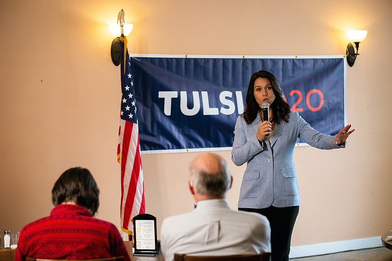 Photo by Elizabeth Frantz of the New York Times / Democratic presidential candidate Rep. Tulsi Gabbard, D-Hawaii, speaks at a campaign event in Berlin, New Hampshire, on Oct. 11, 2019. In a podcast interview on Oct. 18, former Secretary of State Hillary Clinton suggested that Gabbard was being "groomed" by Russia to run a third-party presidential campaign.