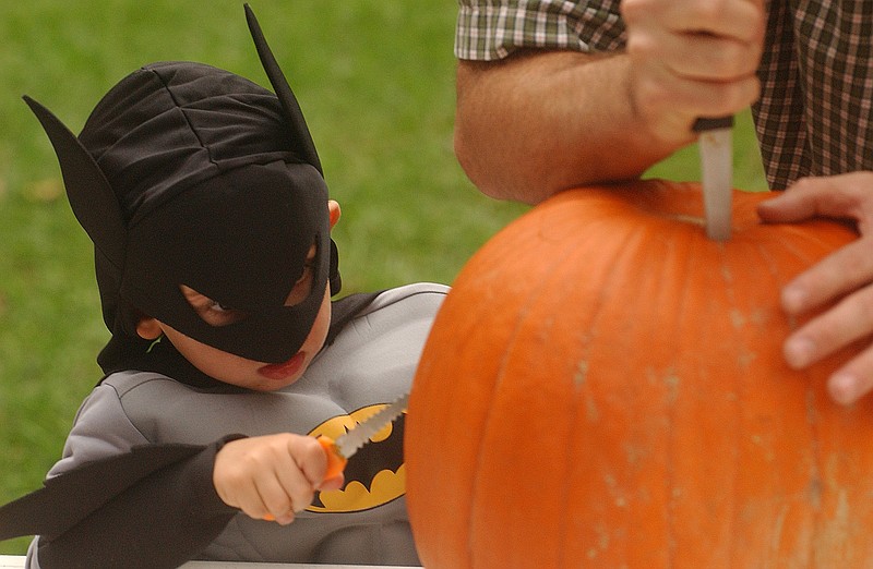 Staff File Photo / When children help with the jack-o'-lantern, give them tools designed for carving. And make sure their trick-or-treating costumes don't obscure their vision.