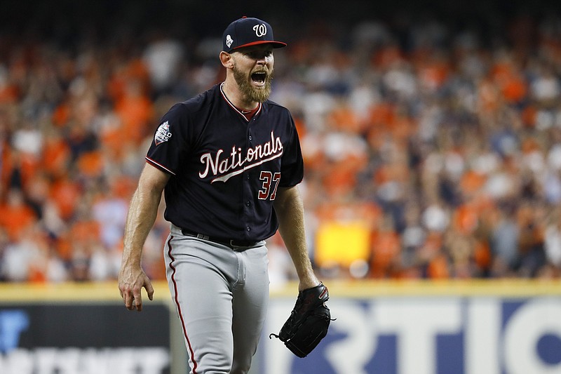 Washington Nationals starting pitcher Stephen Strasburg reacts after the out in the sixth inning of Game 2 of the baseball World Series against the Houston Astros Wednesday, Oct. 23, 2019, in Houston. (AP Photo/Matt Slocum)