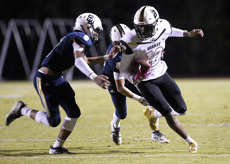 Staff Photo by Robin Rudd / Bradley Central's Tray Curry turns upfield after making a catch during Thursday night's game at Soddy-Daisy.