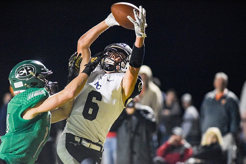 Photo by Cade Deakin / Anderson County's Austin Elliot stretches to make a touchdown catch in the first half of Thursday night's game at East Hamilton.