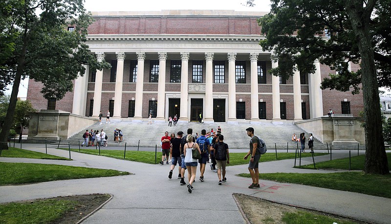 Associated Press File Photo / Students walk near the Widener Library in Harvard Yard at Harvard University in Cambridge, Mass.