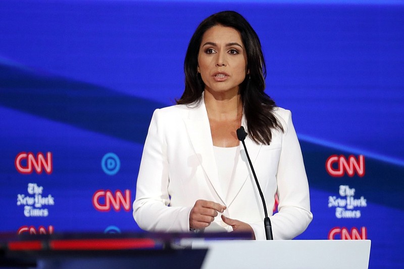 Democratic presidential candidate Rep. Tulsi Gabbard, D-Hawaii, speaks during a Democratic presidential primary debate hosted by CNN/New York Times at Otterbein University, Tuesday, Oct. 15, 2019, in Westerville, Ohio. (AP Photo/John Minchillo)


