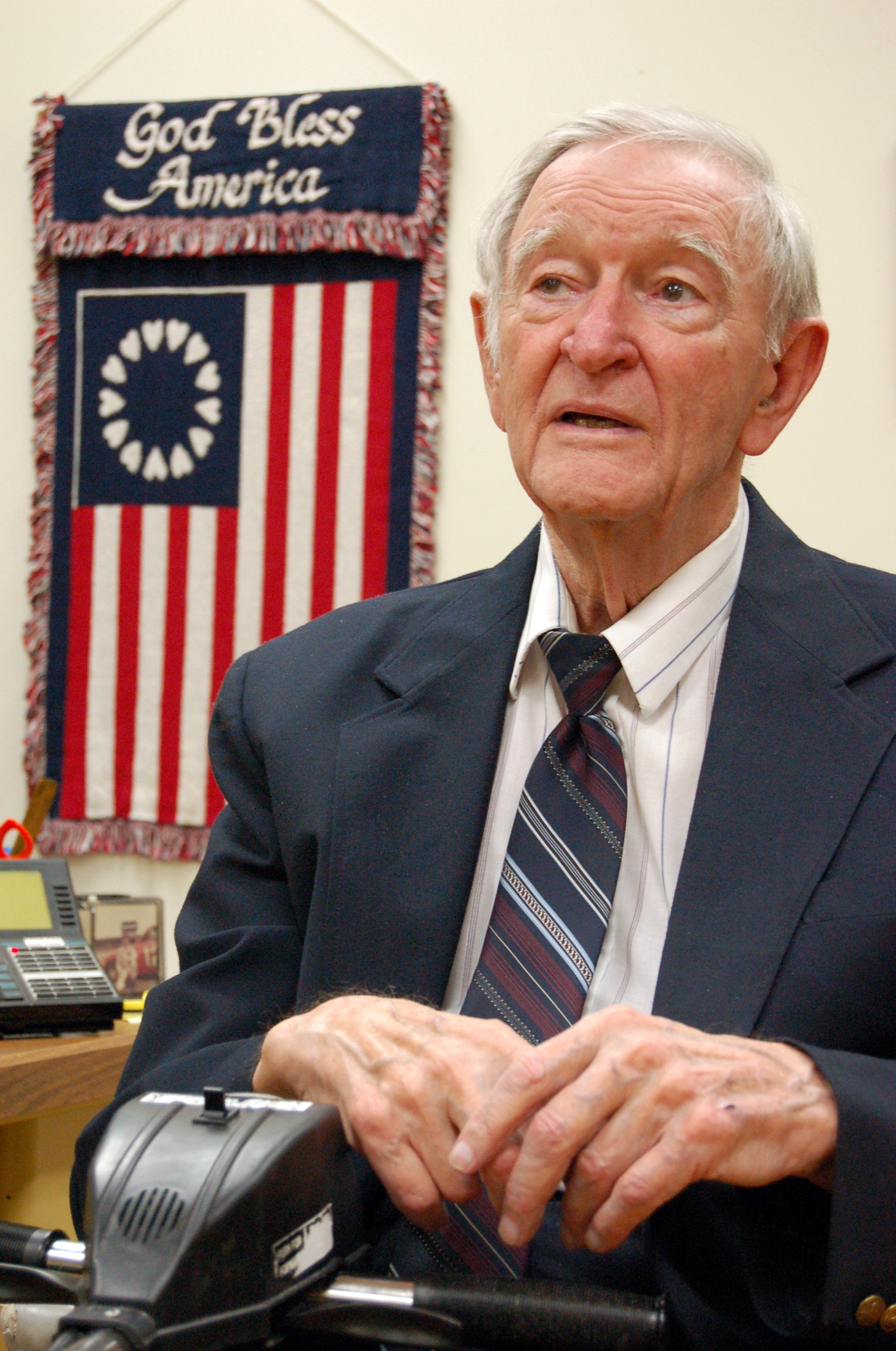 World War II Medal of Honor recipient Charles Coolidge of Signal Mountain, Tenn., discusses April 12, 2006, the theft of his original medal. Coolidge got flimflammed out of his medal -- at a military reunion of all places -- when someone offered to help recondition it and gave him back a fake version of the award. The FBI tracked down Coolidge's real Medal of Honor from a man who was selling and trading medals in Ohio. (AP Photo/ Mark Gilliland)