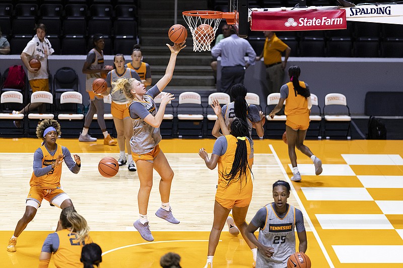 Tennessee Athletics photo by Maury Neipris / Tennessee freshman Emily Saunders goes to the basket for a layup during practice this month at Thompson-Boling Arena in Knoxville.