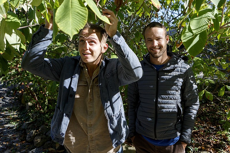 Staff photo by C.B. Schmelter / Refection Riding Arboretum and Nature Center horticulturist Dylan Hackett, left, and Nursery Manager Scott Smith pose for a portrait at the nature preserve.