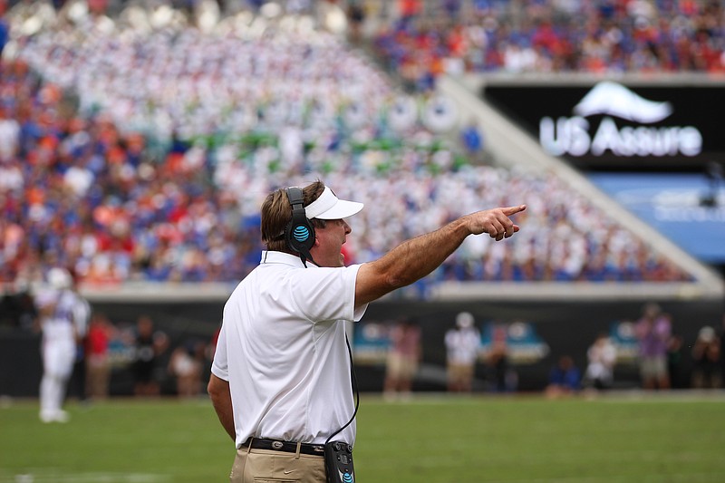 Georgia photo by Lauren Tolbert / Georgia football coach Kirby Smart, shown here during last year's 36-17 win over Florida, believes that playing the Gators in Jacksonville is a disadvantage for both schools in recruiting.