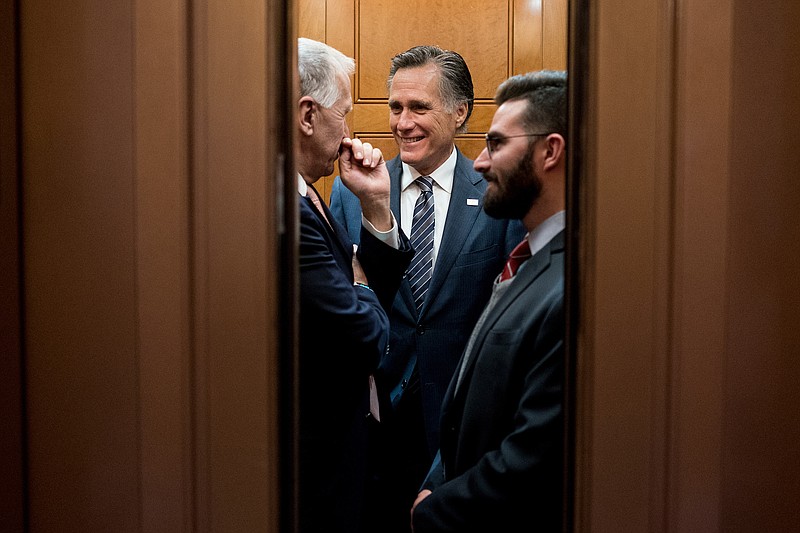 File photo by Erin Schaff of The New York Times / Sen. Mitt Romney, R-Utah, in an elevator on Capitol Hill in Washington on Jan. 31, 2019. The junior senator and former governor of Massachusetts who ran twice for president has been a persistent critic of President Donald Trump's conduct, and therefore perhaps the highest-profile specimen of "human scum" — a designation that seems not to trouble him at all.