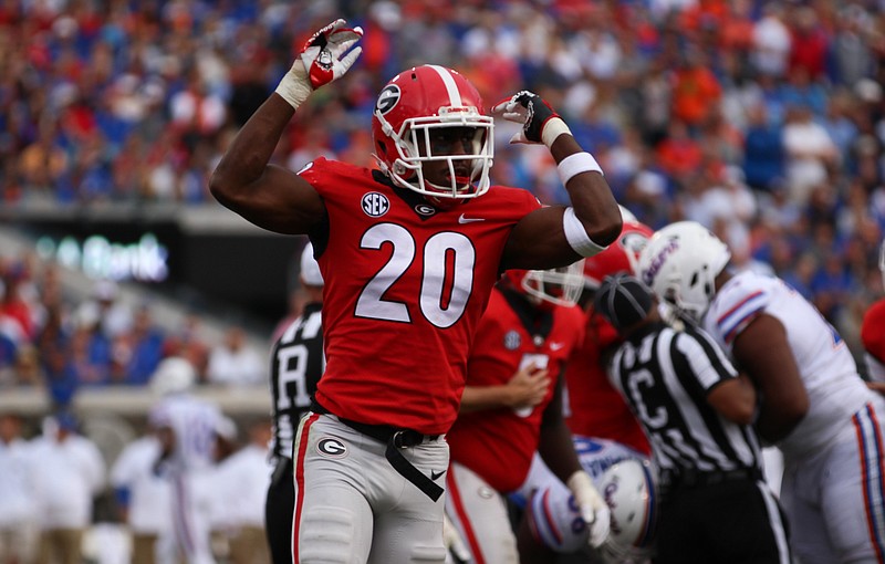 Georgia photo by Lauren Tolbert / Georgia safety J.R. Reed celebrates during last season's 36-17 win over Florida in Jacksonville.