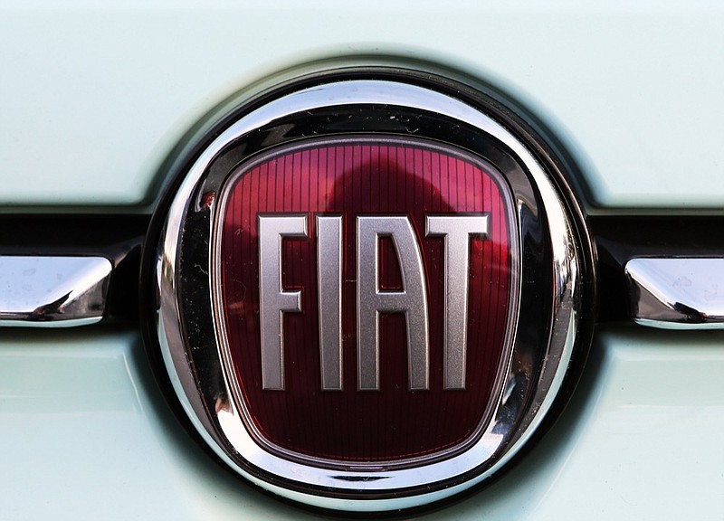 A Fiat logo pictured on a car in Bayonne, southwestern France, Thursday, Oct.31, 2019. (AP Photo/Bob Edme)


