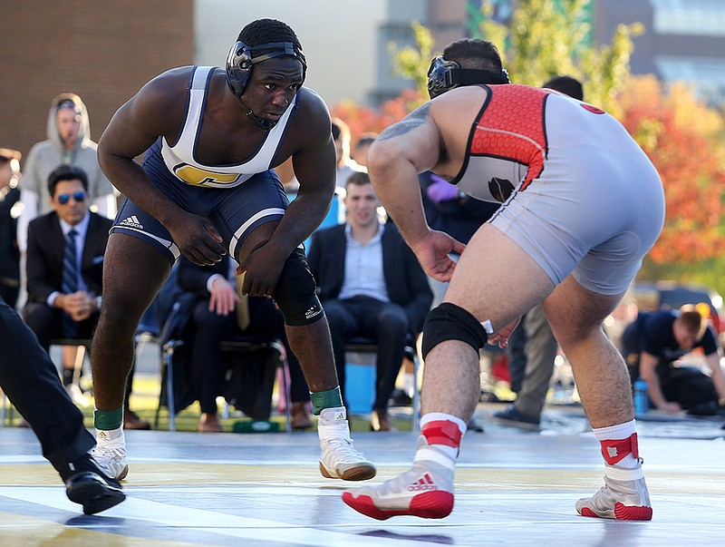 UTC's Rodney Jones, left, faces off with SIU-Edwardsville's Austin Andres during a 197-pound match at Miller Park in the Mocs' season opener on Nov. 1. / Staff photo by Erin O. Smith
