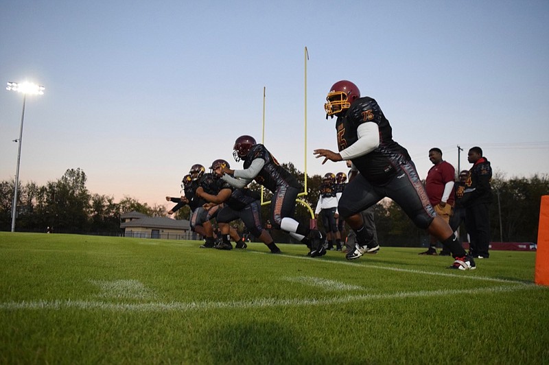 The Howard Hustling Tigers warm up before they host the East Hamilton Hurricanes in a key TSSAA football game on Friday, Nov. 1, 2019. / Staff Photo by Robin Rudd

