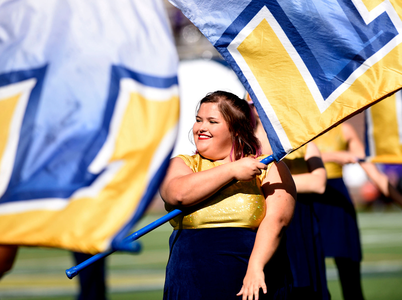 Staff Photo by Robin Rudd/ The UTC flag corps preforms before the game. The University of Tennessee at Chattanooga Mocs hosted the Furman Paladins in a Southern Conference football game at Finley Stadium on November 2, 2019.
