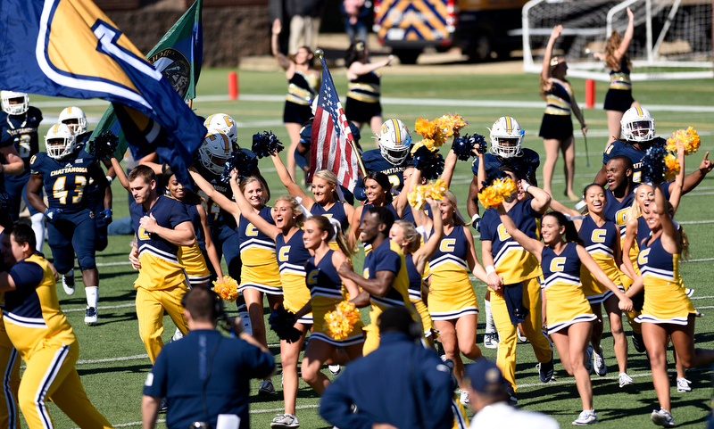 Staff Photo by Robin Rudd/ The cheerleaders lead the Mocs onto the field. The University of Tennessee at Chattanooga Mocs hosted the Furman Paladins in a Southern Conference football game at Finley Stadium on November 2, 2019.