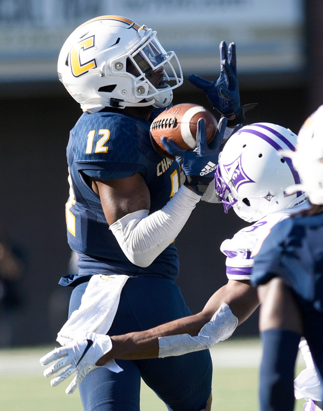 Staff Photo by Robin Rudd/ UTC's Reginald Henderson (12) struggles to gain control of the ball, but the pass was incomplete. The University of Tennessee at Chattanooga Mocs hosted the Furman Paladins in a Southern Conference football game at Finley Stadium on November 2, 2019.