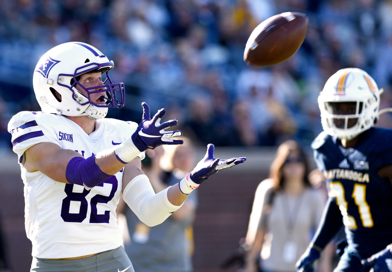 Staff Photo by Robin Rudd/ Furman's Ryan Miller (82) gets behind UTC's D.J. Jackson and catches a pass for a touchdown. The University of Tennessee at Chattanooga Mocs hosted the Furman Paladins in a Southern Conference football game at Finley Stadium on November 2, 2019.