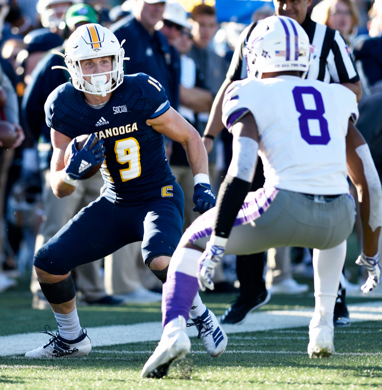 Staff Photo by Robin Rudd/ UTC's Bryce Nunnley (19) looks for running room after catching a pass. The University of Tennessee at Chattanooga Mocs hosted the Furman Paladins in a Southern Conference football game at Finley Stadium on November 2, 2019.