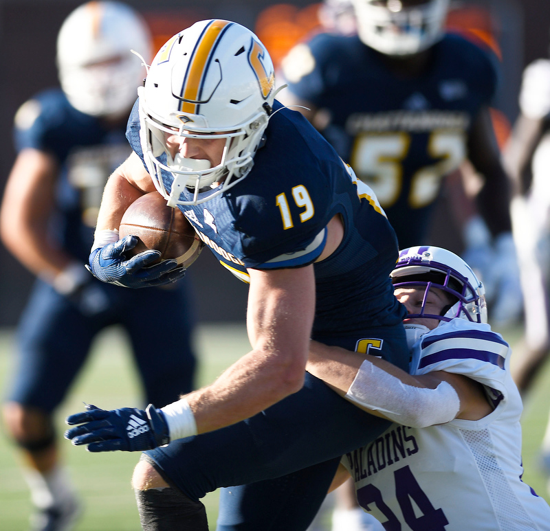 Staff Photo by Robin Rudd/ UTC's Bryce Nunnely (19) makes a big pass reception to keep a UTC drive alive. The University of Tennessee at Chattanooga Mocs hosted the Furman Paladins in a Southern Conference football game at Finley Stadium on November 2, 2019.