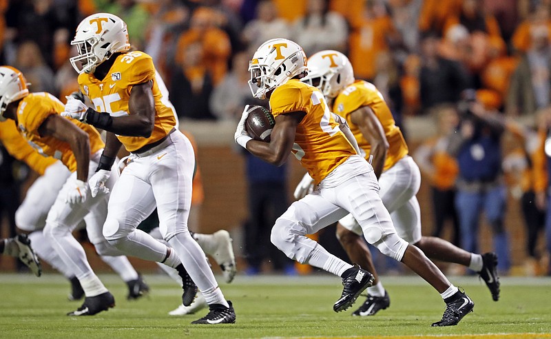 AP Photo by Wade Payne / Tennessee defensive back Bryce Thompson, with ball, runs back one of his three first-half interceptions in Saturday's 30-7 win over UAB in Knoxville.