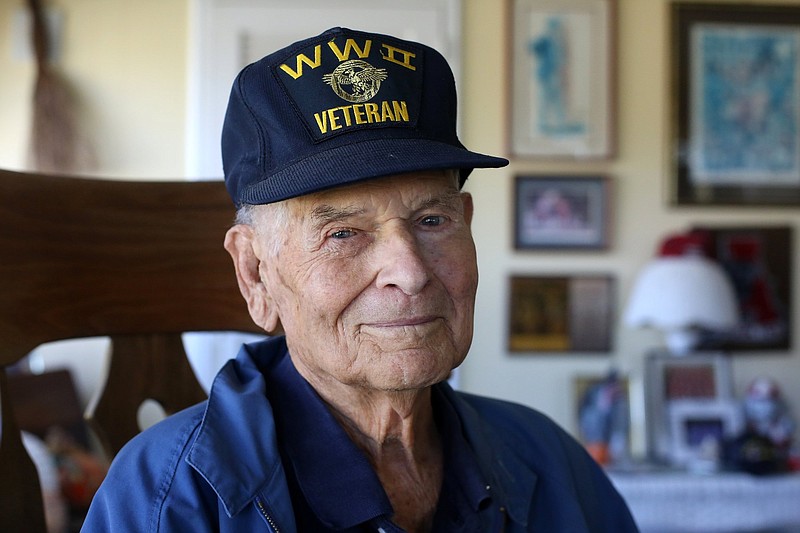 Staff photo by Erin O. Smith / Billy Locklear, a World War II veteran, poses for a photo at his Summerville, Georgia, home Thursday, October 17, 2019. Locklear volunteered to serve in the Marines and was sent overseas to Saipan.