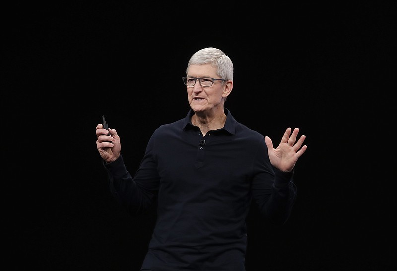 FILE - In this June 3, 2019, file photo Apple CEO Tim Cook speaks at the Apple Worldwide Developers Conference in San Jose, Calif. Apple said Monday, Nov. 4, that it's committing $2.5 billion to combat California's housing crisis. (AP Photo/Jeff Chiu, File)
